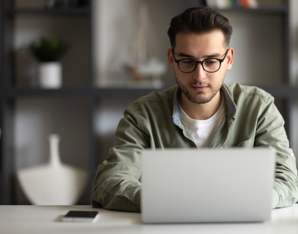 User working on laptop